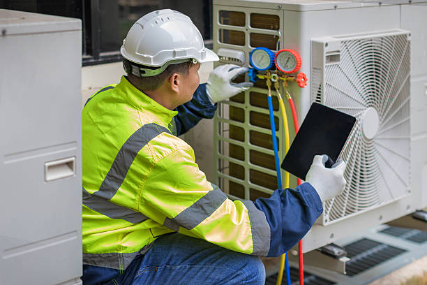 Professional Heat Pump Repair technician working in Rossville, TN